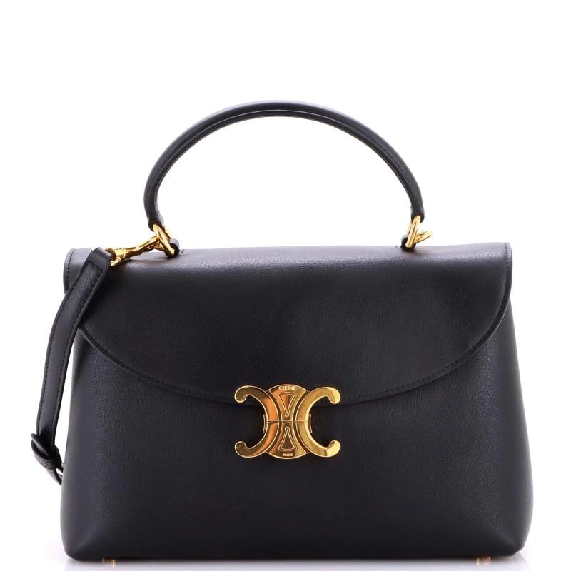 Celine Nino Top Handle Bag Leather Medium: Accessories: With Strap Measurements: Handle Drop None", Height 7", Width 10", Depth 4", Strap Drop None" . Condition: Pre-owned - Excellent,Brand: Celine,Exterior Material: Leather,Style: Top Handle,