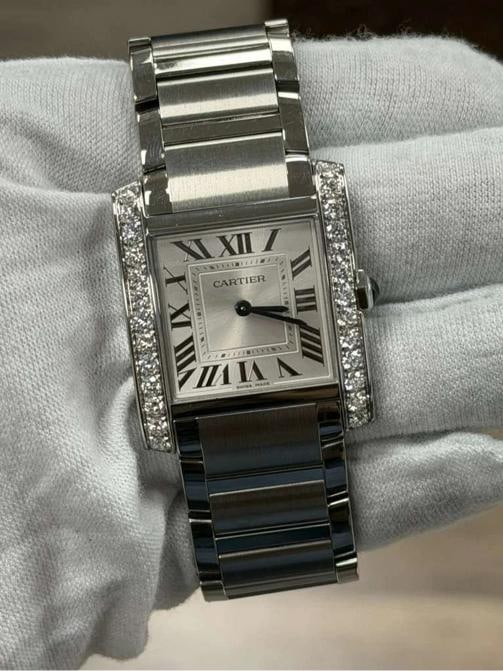 Cartier Tank Francaise W4TA0021 SS White Roman Dial Quartz Men's Watch 28mm: Case Size 28mm Wrist Fit 5.75 inches Box No Papers No Condition Ã¢â‚¬â€ Used - Good Full Specifications Brand Cartier Serial # 447xxxxxxxxx Gender Men Band M