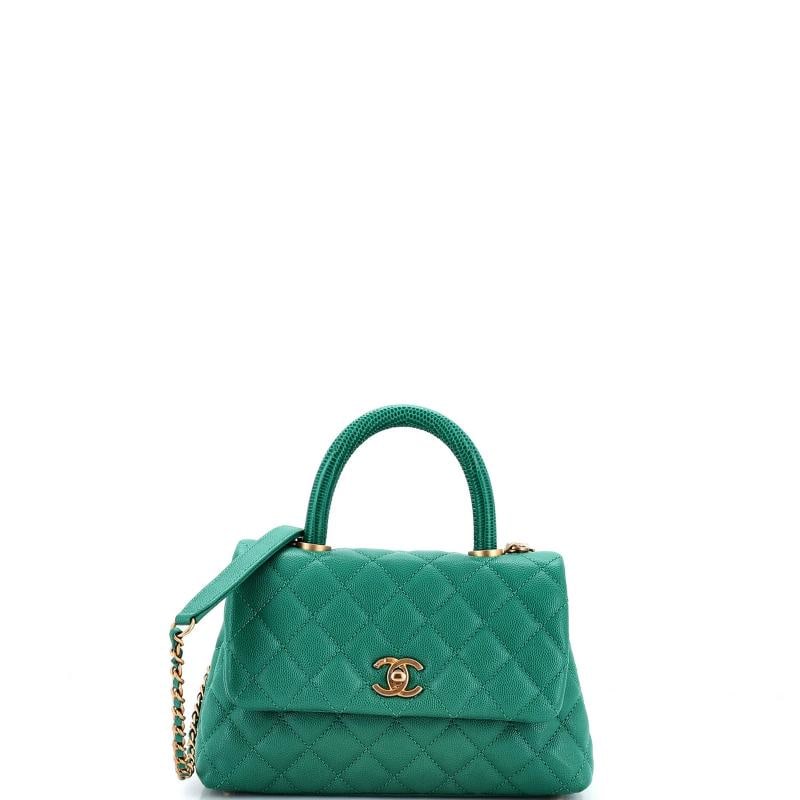 Chanel Coco Top Handle Bag Quilted Caviar with Lizard Embossed Handle Mini: Accessories: Authenticity Card, With Strap Measurements: Handle Drop 3", Height 5.5", Width 9", Depth 4", Strap Drop 18" . Condition: Pre-owned - Good,Brand: Chanel,Exterior Material: Leather,Style: