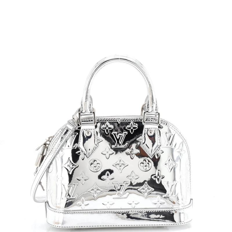 Louis Vuitton Alma Handbag Monogram Miroir PVC BB: Accessories: Keys, Lock, With Strap Measurements: Height 7", Width 9.5", Depth 4.5" . Condition: Pre-owned - Excellent,Brand: Louis Vuitton,Exterior Material: Pvc,Style: Top Handle,Exterior Color: