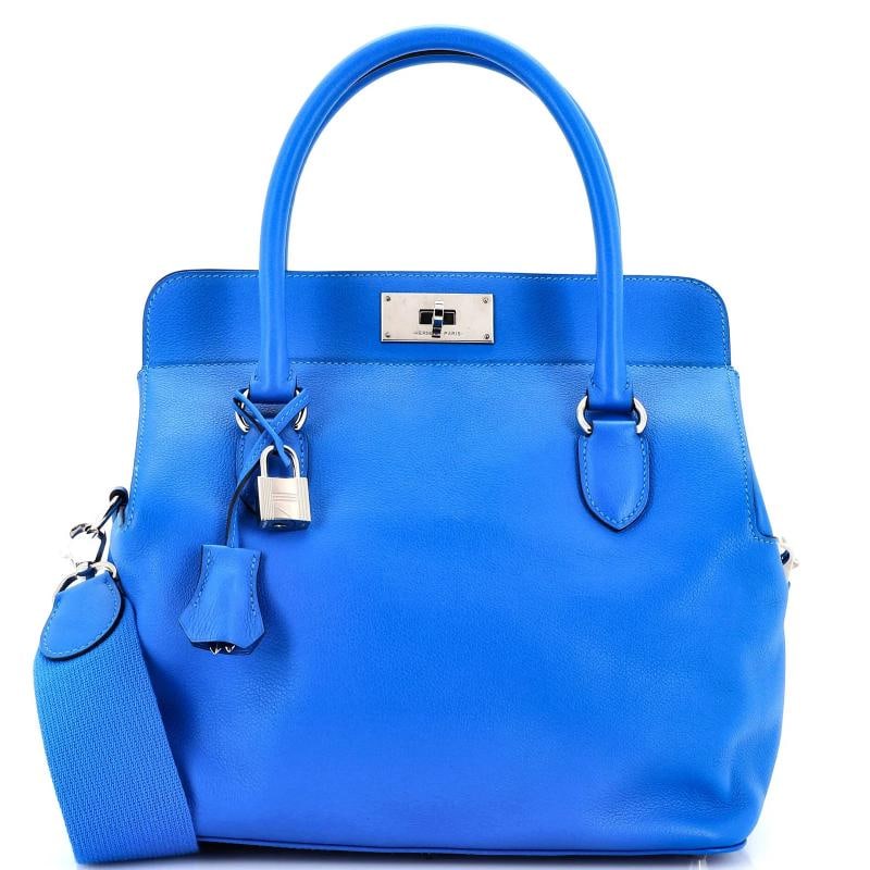 Hermes Toolbox Bag Evercolor 26: Accessories: Keys, Lock, Clochette, With Strap Measurements: Handle Drop 3", Height 10", Width 10", Depth 7", Strap Drop 10". Condition: Pre-owned - Excellent,Brand: Hermes,Exterior Material: