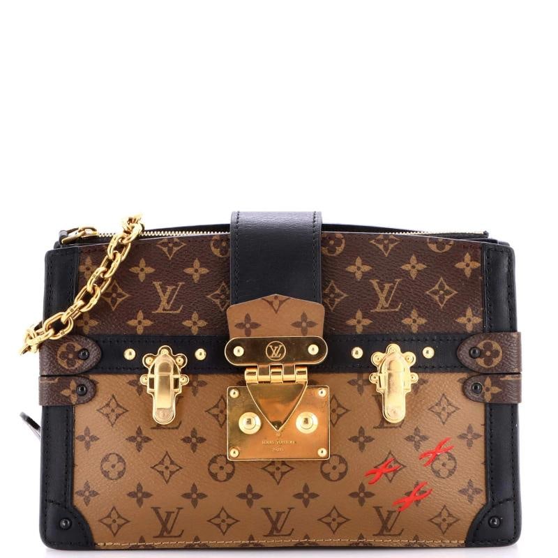 Louis Vuitton Trunk Clutch Reverse Monogram Canvas: Accessories: With Strap Measurements: Height 6", Width 9", Depth 3", Strap Drop 21-23". Condition: Pre-owned - Good,Brand: Louis Vuitton,Exterior Material: Canvas Coated,Style: Clutches,Exterior