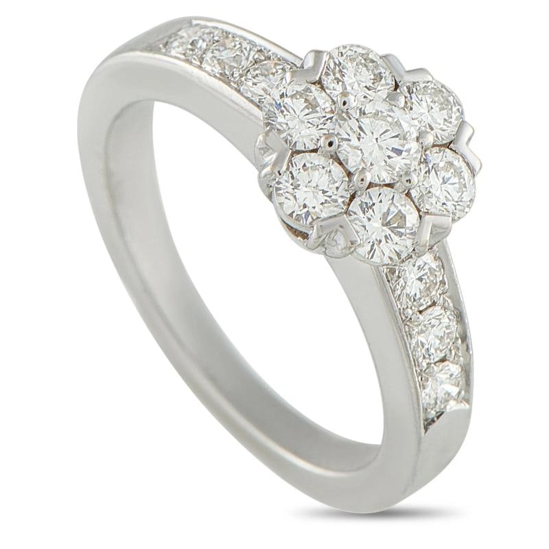 Van Cleef & Arpels Fleurette 18K White Gold Diamond Ring #4901: features a 2mm wide band and a 6mm top height. Condition: Pre-owned - Good: This item has been gently used but is in good condition. It might have a few signs of wear, like light scratches or