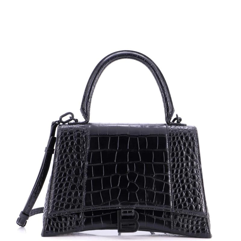 Balenciaga Hourglass Top Handle Bag Crocodile Embossed Leather Medium: Accessories: With Strap Measurements: Handle Drop 4.5", Height 7", Width 10.5", Depth 3.5", Strap Drop 8.5-23". Condition: Pre-owned - Excellent,Brand: Balenciaga,Exterior Material: Leather,Style:
