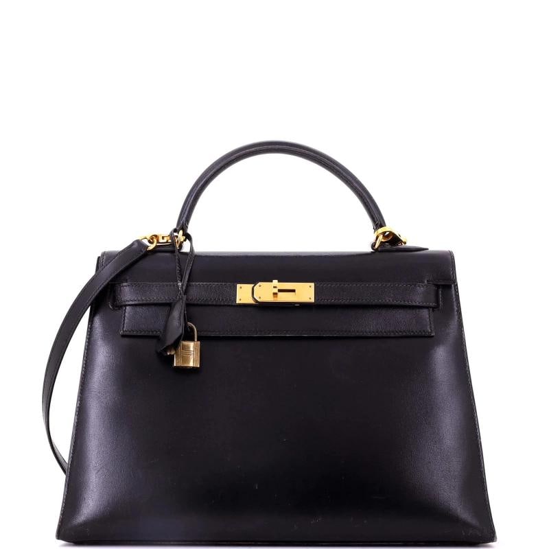 Hermes Kelly Handbag Black Box Calf with Gold Hardware 32: Accessories: Keys, Lock, Clochette, With Strap Measurements: Height 9", Width 12.5", Depth 4". Condition: Pre-owned - Fair,Brand: Hermes,Exterior Material: Leather,Style: Top Handle,Exterior Color: Bl