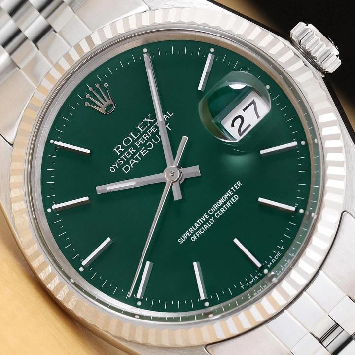 ROLEX MENS DATEJUST 16014 GREEN DIAL 18K GOLD STEEL WATCH w/ JUBILEE BRACELET: This is an authentic Rolex Datejust 16014 watch with Rolex stick dial Ref., Rolex 18K white gold fluted bezel, and custom stainless steel jubilee band. Descriptions: Brand: Rolex Model: Datejust Refer