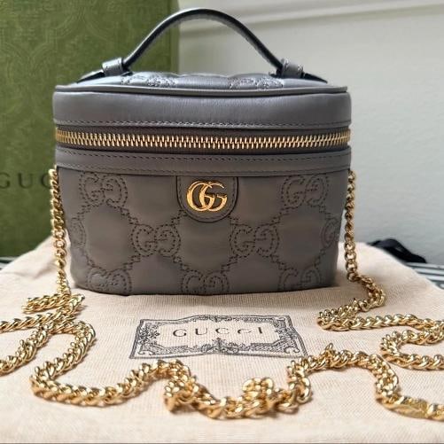 Gucci GG Marmont Mini Top Handle Shoulder Bag in Grey: Condition: Pre-owned - Excellent,Brand: Gucci,Accessories: Original Dust Bag,Department: Women,Closure: Zip,Size: Mini,Hardware Color: Gold,Exterior Color: grey,Style: Crossbody,Exterior Material: