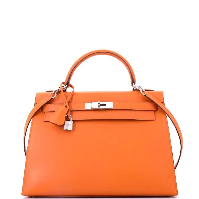 Hermes Kelly Handbag Orange Box Calf with Palladium Hardware 32: Condition: Pre-owned - Good,Brand: Hermes,Exterior Material: Leather,Style: Top Handle,Exterior Color: Orange,Department: Women,Size: 32,Accessories: Keys, Lock, Clochette, Box, With Strap Condition: