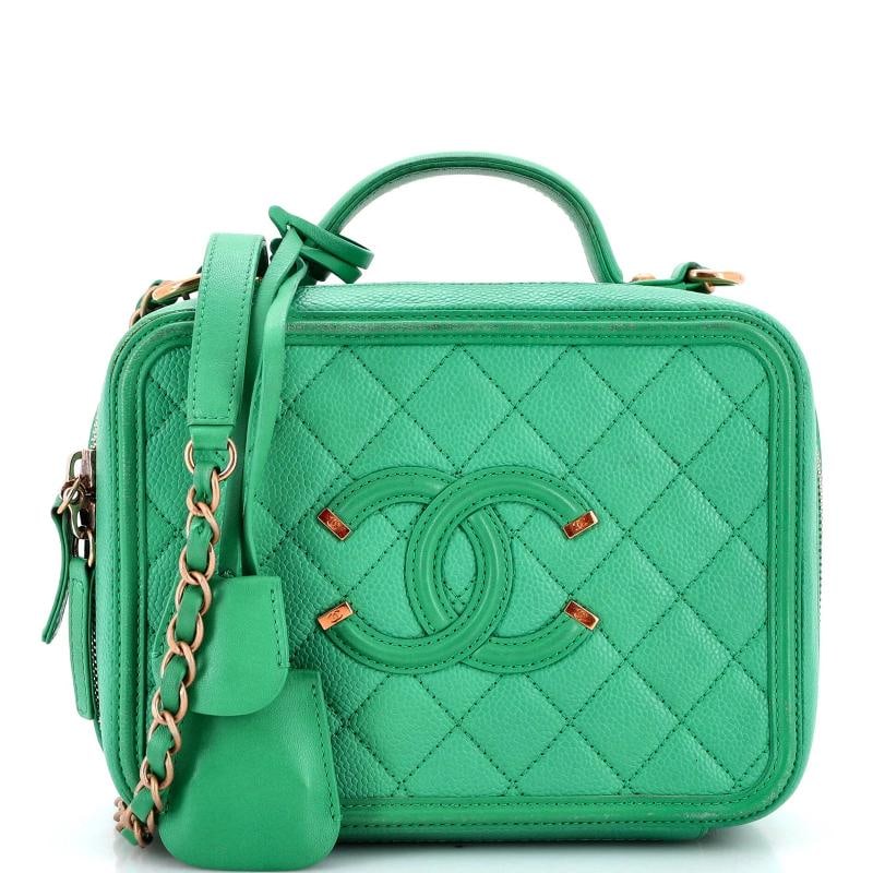 Chanel Filigree Vanity Case Quilted Caviar Medium: Accessories: Extra Clochette, Dust Bag, Lock, Keys, Clochette Measurements: Handle Drop 1.5", Height 6", Width 8", Depth 3", Strap Drop 19.5". Condition: Pre-owned - Good,Brand: Chanel,Exterior