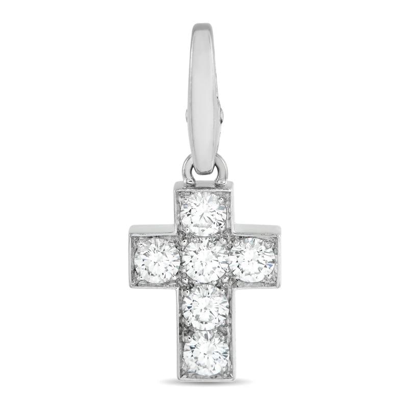 Cartier 18K White Gold Cross 0.90ct Diamond Pendant: elevated by Diamonds with a total weight of 0.90 carats. It measures 1.0 long by 0.45 wide.. Condition: Pre-owned - Good: This item has been gently used but is in good condition. It might have a few