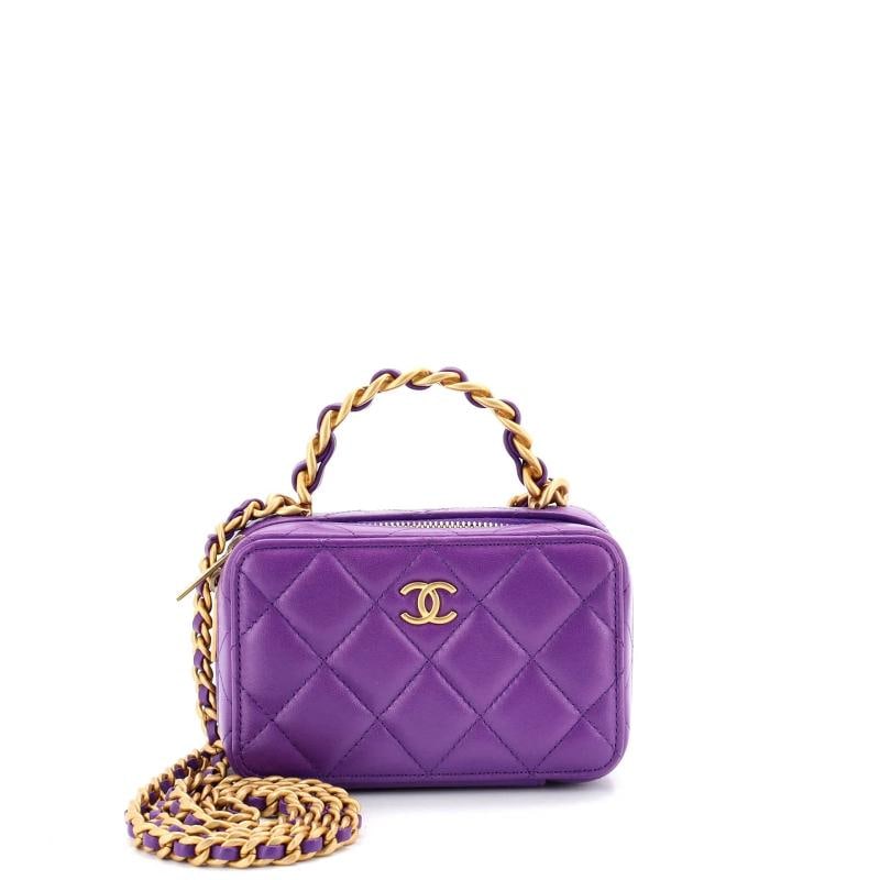 Chanel Woven Chain Top Handle Vanity Case Quilted Lambskin Mini: Measurements: Height 4", Width 5.5", Depth 2.5" . Condition: Pre-owned - Excellent,Brand: Chanel,Exterior Material: Leather,Style: Cross Body Bags,Exterior Color: Purple,Department: Women,Size: Mini