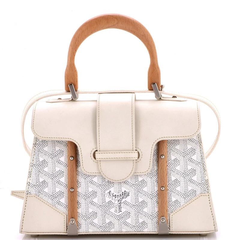 Goyard Structured Saigon Top Handle Bag Coated Canvas with Leather Mini: Accessories: Dust Bag, With Strap Measurements: Handle Drop 3", Height 5", Width 8.5", Depth 3", Strap Drop 19-22". Condition: Pre-owned - Excellent,Brand: Goyard,Exterior Material: Canvas Coated, Lea