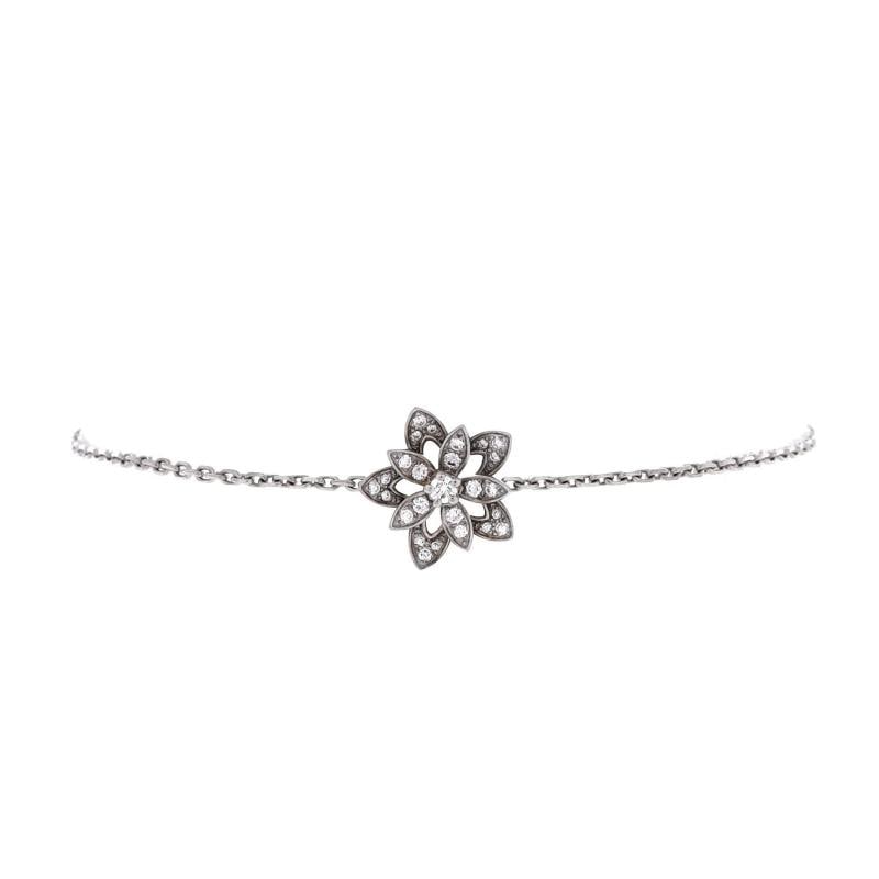 Van Cleef & Arpels Lotus Openwork Bracelet 18K White Gold with Diamonds Mini: Condition: Pre-owned - Good,Brand: Van Cleef & Arpels,Main Stone: Diamond,Metal: 18K White Gold,Metal Purity: 18K,Style: Bracelet,Type: Bracelet,Color: White Gold,Material: 18K White Gold, Diamond