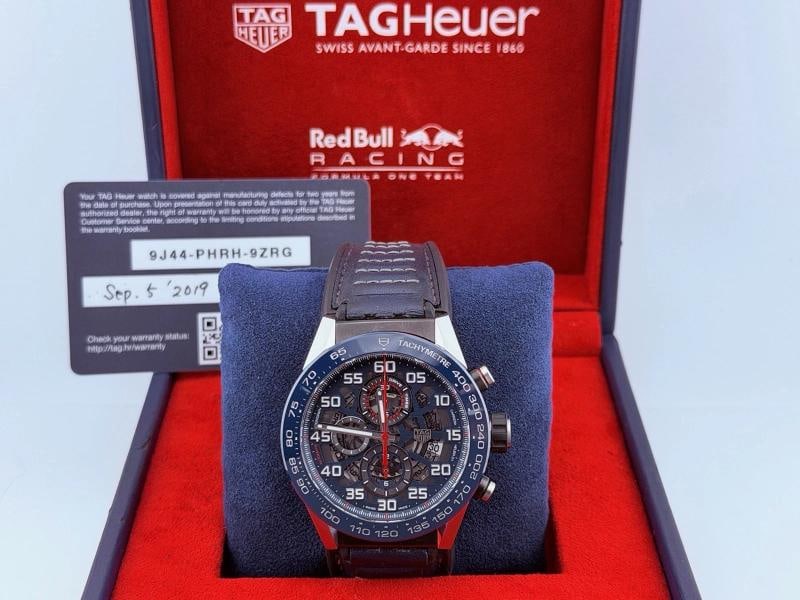 Tag Heuer Carrera Red Bull CAR2A1N.FT6100 45mm Blue Skeleton Dial Box Papers: Style Number: CAR2A1N.FT6100 Year: 2019 Model: Tag Heuer Carrera Red Bull Racing Special Edition Case Material: Stainless Steel Black PVD Band: Blue Rubber Leather Strap Bezel: Blue Ceramic Dial: