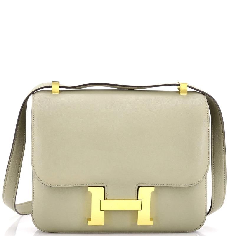 Hermes Constance Bag Swift 24: Condition: Pre-owned - Good,Brand: Hermes,Exterior Material: Leather,Style: Shoulder Bags,Exterior Color: Green,Department: Women,Size: 24,Accessories: Dust Bag Condition: Outlet. Exterior: scuffs,