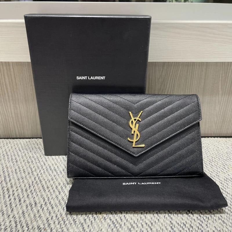YSL Saint Laurent Monogram Large Wallet on Chain in Black Grained Leather: Condition: Pre-owned - Excellent,Bag Width: 9 in,Shape: Rectangle,Closure: Magnetic,Handle/Strap Color: Gold,Size: Large,Hardware Color: Gold,Bag Depth: 1.5 in,Vintage: No,Personalize: