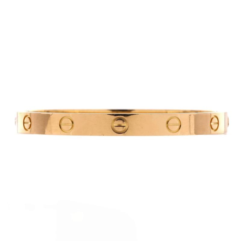 Cartier Love Bracelet 18K Yellow Gold: Measurements: Circumference: 6 ", Width: 6 mm . Condition: Pre-owned - Good,Brand: Cartier,Main Stone: Unknown,Metal: 18K Yellow Gold,Metal Purity: 18K,Style: Bracelet,Type: Bracelet,Color: Yellow