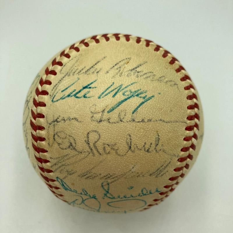 1955 Brooklyn Dodgers W.S. Champs Team Signed Baseball Jackie Robinson PSA DNA: 22 signatures with Jackie Robinson, Roy Campanella and many others. There are a few clubhouse signatures. Comes with PSA DNA full letter COA. . Sport: Baseball-MLB,Player: Jackie Robinson,Autograph Au