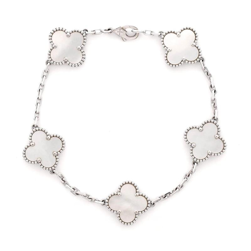 Van Cleef & Arpels Vintage Alhambra 5 Motifs Bracelet 18K White Gold and Mother: Measurements: Circumference: 7.50 ", Width: 14.90 mm . Condition: Pre-owned - Good,Brand: Van Cleef & Arpels,Main Stone: Unknown,Metal: 18K White Gold,Metal Purity: 18K,Style: Bracelet,Type: Bracelet,