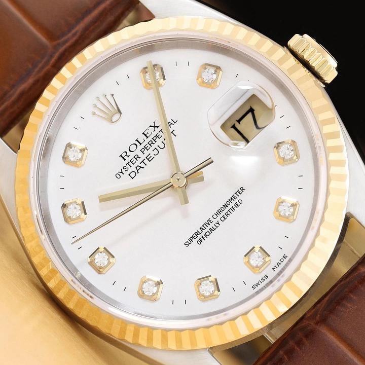 ROLEX MENS DATEJUST 16233 WHITE DIAMOND 18K GOLD STEEL WATCH w/ LEATHER BAND: This is an authentic Rolex Datejust 16233 watch with Rolex dial Ref. with added diamond markers, Rolex 18K yellow gold fluted bezel, and custom genuine brown leather strap. Descriptions: Brand: Rolex 