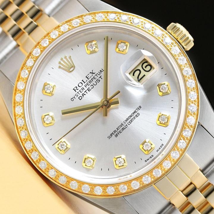ROLEX MENS DATEJUST 16013 2-TONE 18K YELLOW GOLD DIAMOND QUICKSET JUBILEE WATCH: This is an authentic Rolex Datejust 16013 watch with Rolex 18K yellow gold and stainless steel jubilee bracelet, Rolex dial Ref. with added genuine diamond markers, and custom 18K yellow gold diamond 