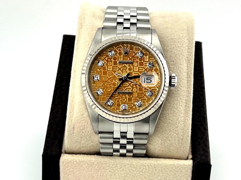 Rolex Datejust 16234 36mm TROPICAL Jubilee Diamond Dial 18k Gold Stainless Steel: Condition: Pre-owned - Excellent,Country of Origin: Switzerland,Bezel Color: Silver,Movement: Mechanical (Automatic),Indices: Diamond Markers,Year Manufactured: 2000-2009,Band/Strap: Rolex Jubilee,Ref