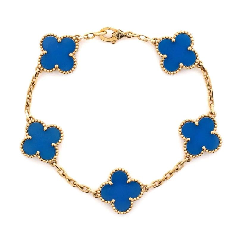 Van Cleef & Arpels Vintage Alhambra 5 Motifs Bracelet 18K Yellow Gold and Agate: Measurements: Circumference: 7 ", Width: 14.90 mm . Condition: Pre-owned - Good,Brand: Van Cleef & Arpels,Main Stone: Agate,Metal: 18K Yellow Gold,Metal Purity: 18K,Style: Bracelet,Type: Bracelet,Colo