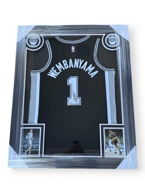 Victor Wembanyama Signed Custom Framed Jersey (Fanatics): Player: Victor Wembanyama,Product: Jersey,Original/Reprint: Original,Autograph Authentication: Fanatics Authentic,Team: San Antonio Spurs,Signed: yes,Country of Origin: United States