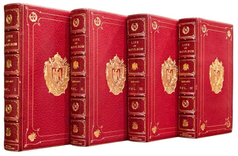 Ireland / c1830 Life of Napoleon Bound by Bayntun Extra Illustrated Color Plates: Publication: London: G. Berger, 1830 Description: George Cruikshank. THIS STUNNING COMPLETE FOUR VOLUME SET IS IN NEAR FINE CONDITION BEAUTIFULLY BOUND BY BAYNTUN IN FULL CRUSHED MOROCCO WITH BRIGHT G