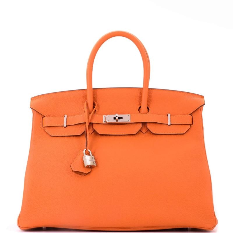 Hermes Birkin Handbag Orange Togo with Palladium Hardware 35: Accessories: Clochette, Lock, Keys Measurements: Handle Drop None", Height 10", Width 13.5", Depth 7", Strap Drop None". Condition: Pre-owned - Excellent,Brand: Hermes,Exterior Material: Leather,Style