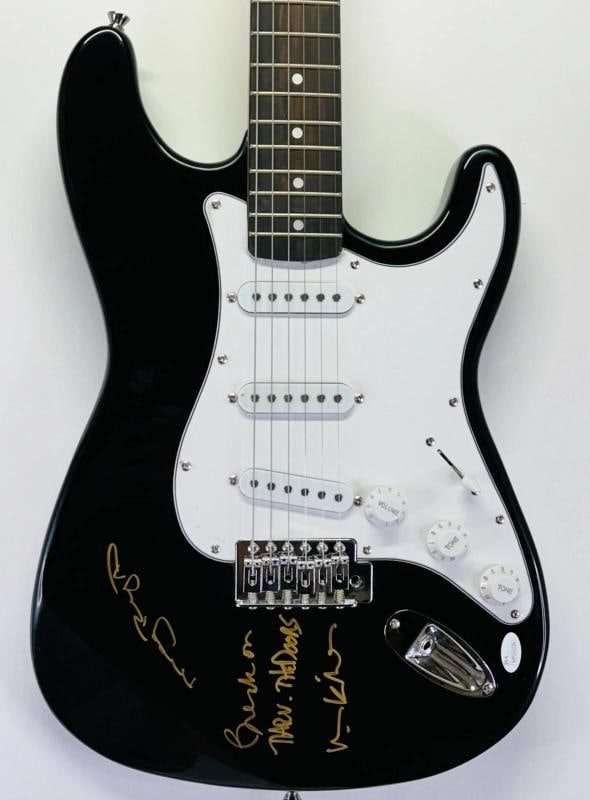 VAL KILMER MEG RYAN Signed Autograph Electric Guitar THE DOORS JSA COA Beckett: Industry: Music,Signed: Yes,Autograph Authentication: Beckett and JSA,Object Type: Guitar & Guitar Pick,Original/Reproduction: Original,Country of Origin: United States