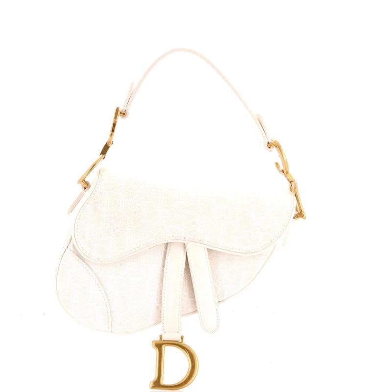 Christian Dior Saddle Handbag Oblique Canvas Mini: Condition: Pre-owned - Excellent,Brand: Christian Dior,Exterior Material: Canvas Plain,Style: Shoulder Bags,Exterior Color: Neutral,Department: Women,Size: Mini Condition: Great. Exterior: minor