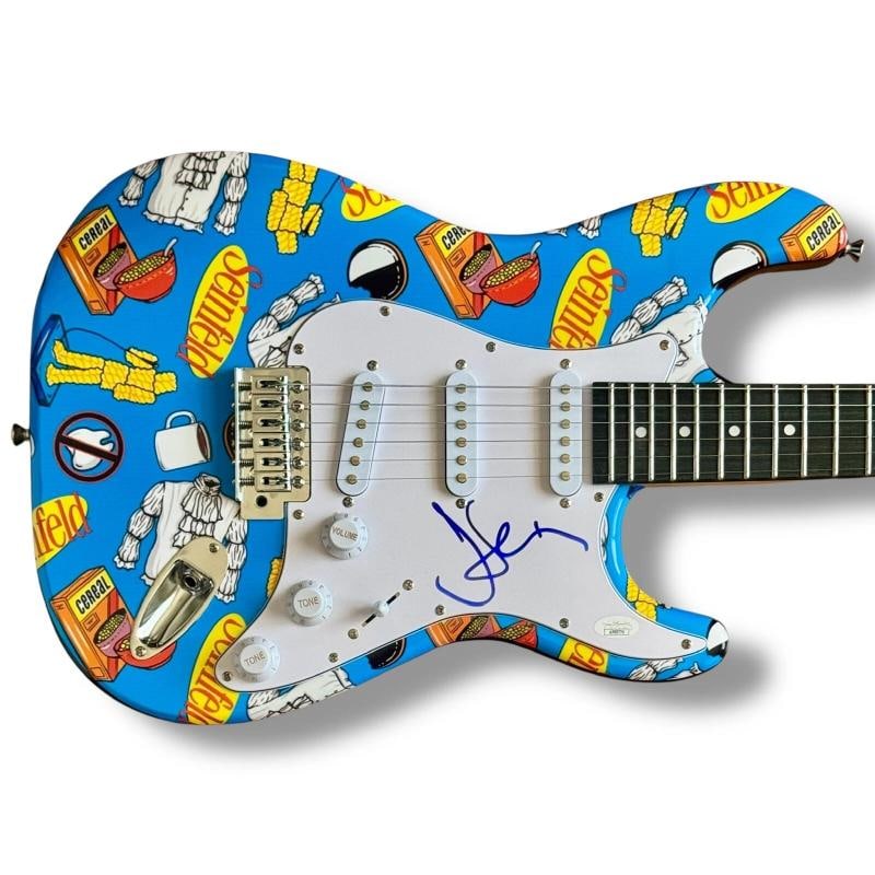Jerry Seinfeld Signed Guitar Custom Graphics JSA COA Seinfeld Puffy Shirt: Object Type: Guitar,Signed by: Jerry Seinfeld,Industry: Television,Autograph Authentication: James Spence (JSA),Original/Reproduction: Original,Show: Seinfeld,Signed: Yes,Country of Origin: United Sta