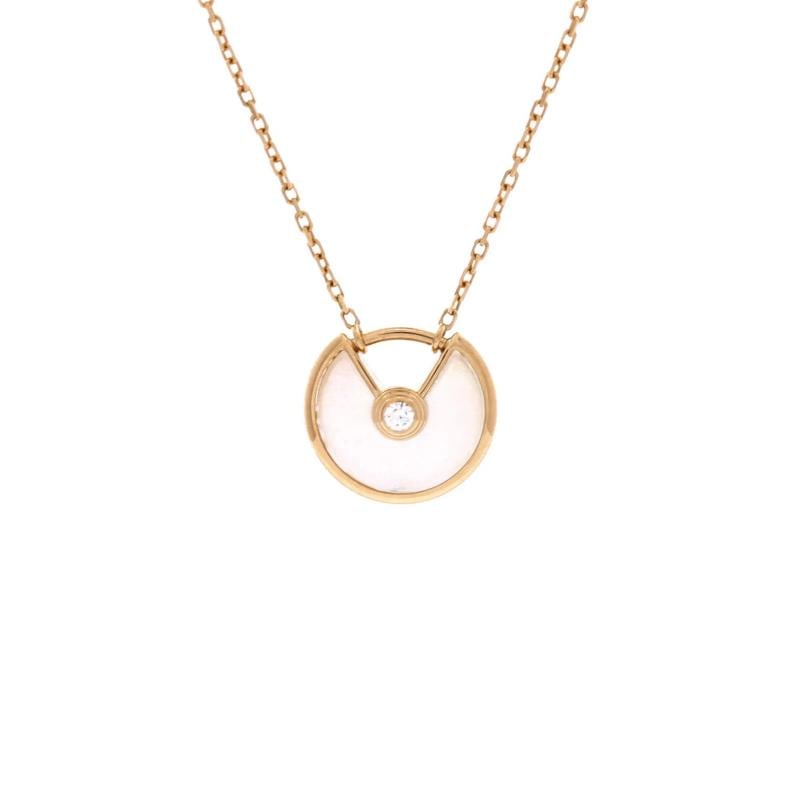 Cartier Amulette de Cartier Pendant Necklace 18K Yellow Gold with Mother of: Measurements: Length: 15.25 - 16.25 ", Pendant Length: 11.20 mm, Pendant Width: 12.00 mm . Condition: Pre-owned - Good,Brand: Cartier,Main Stone: Diamond,Metal: 18K Yellow Gold,Metal Purity: