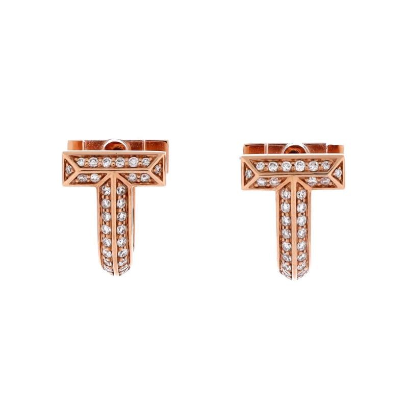 Tiffany & Co. T1 Huggie Hoop Earrings 18K Rose Gold with Half Pave Diamonds: Measurements: Height/Length: 12.15 mm, Width: 9.40 mm . Condition: Pre-owned - Good,Brand: Tiffany & Co.,Main Stone: Diamond,Metal: 18K Rose Gold,Metal Purity: 18K,Style: Hoop,Type: Earrings,Color: