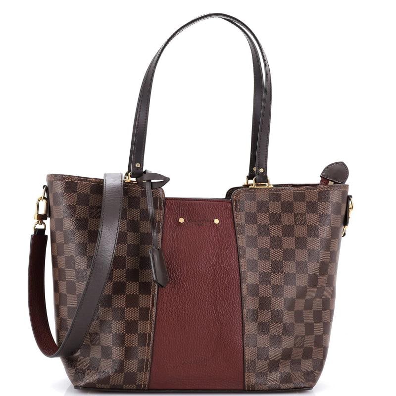 Louis Vuitton Jersey Handbag Damier with Leather: Accessories: Clochette, With Strap Measurements: Handle Drop 10", Height 11", Width 12", Depth 5", Strap Drop 17". Condition: Pre-owned - Good,Brand: Louis Vuitton,Exterior Material: Canvas Coated,