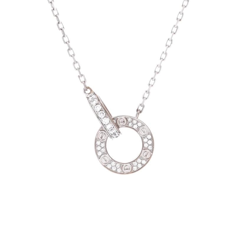 Cartier Love Interlocking Pave Necklace 18K White Gold and Diamonds: Measurements: Length: 14.75 - 16.0 ", Pendant Length: 0.75 ", Pendant Width: 2.65 mm . Condition: Pre-owned - Good,Brand: Cartier,Main Stone: Diamond,Metal: 18K White Gold,Metal Purity: 18K,Style: Nec