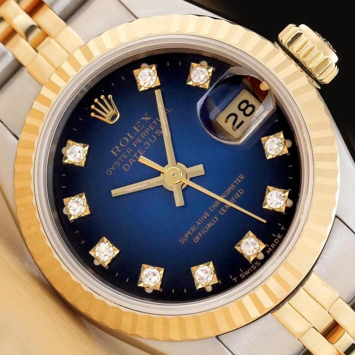 ROLEX DATEJUST 69173 BLUE VIGNETTE FACTORY DIAMOND 18K GOLD STEEL JUBILEE WATCH: This is an authentic Rolex Datejust 69173 watch with original Rolex 18K yellow gold and stainless steel jubilee bracelet, factory Rolex diamond dial, and Rolex 18K yellow gold fluted bezel.