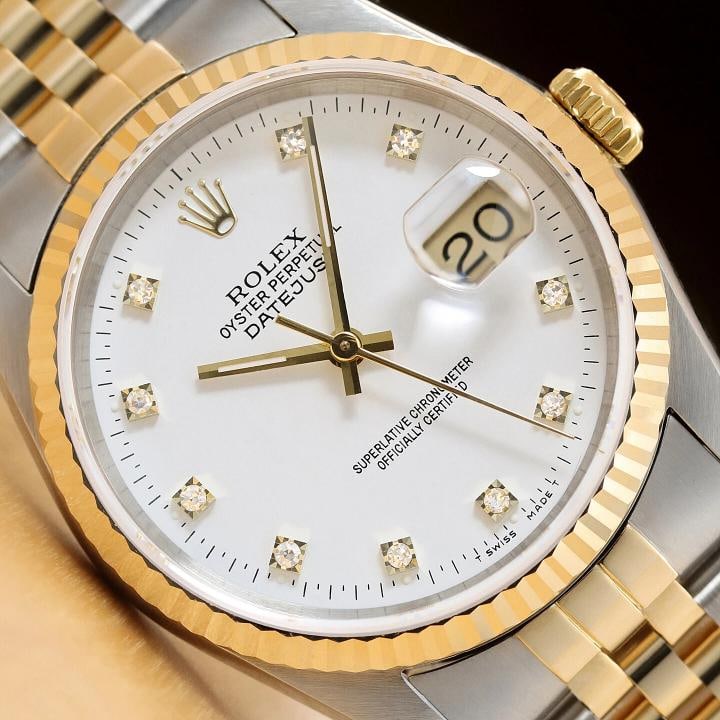 ROLEX MENS DATEJUST 16233 FACTORY DIAMOND 18K GOLD STAINLESS STEEL WHITE WATCH: This is an authentic Rolex Datejust 16233 watch with Rolex 18K yellow gold and stainless steel jubilee bracelet, factory Rolex diamond dial Ref., and Rolex 18K yellow gold fluted bezel..Descriptions: 