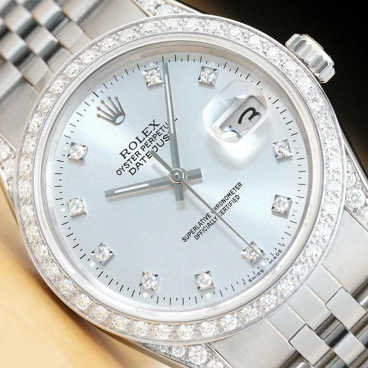 MENS ROLEX DATEJUST 16014 FACTORY DIAMOND DIAL 18K GOLD DIAMOND BEZEL LUGS WATCH: This is an authentic Rolex Datejust 16014 watch with Rolex stainless steel jubilee bracelet, factory Rolex diamond dial Ref., custom 18K white gold diamond bezel, and added genuine diamonds on the lug