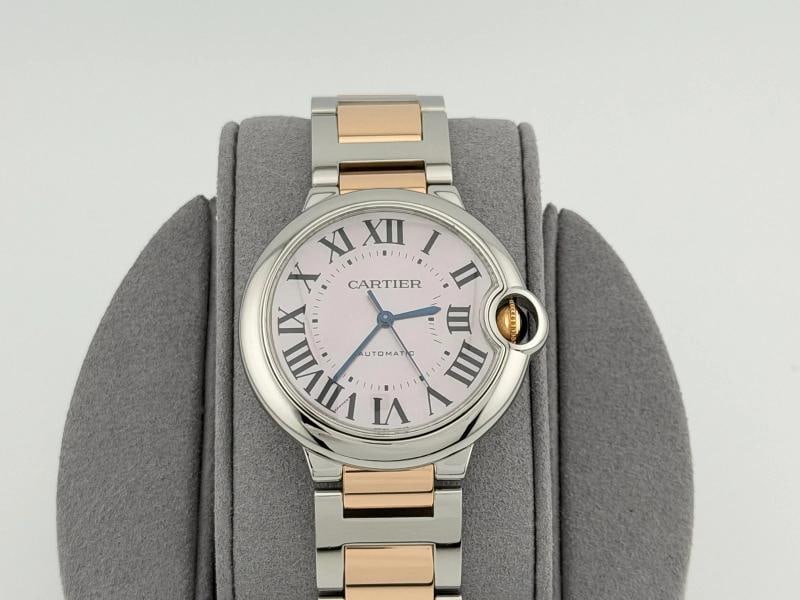 Cartier Ballon Bleu W6920033 3284 36mm Pink Mother Of Pearl Dial 18k Gold Steel: Condition: Pre-owned - Excellent,Bezel Color: Silver,Movement: Mechanical (Automatic),Dial Pattern: Mother of Pearl,Indices: Roman Numerals,Band/Strap: Bracelet,Reference Number: 3284, W6920033,Brand:
