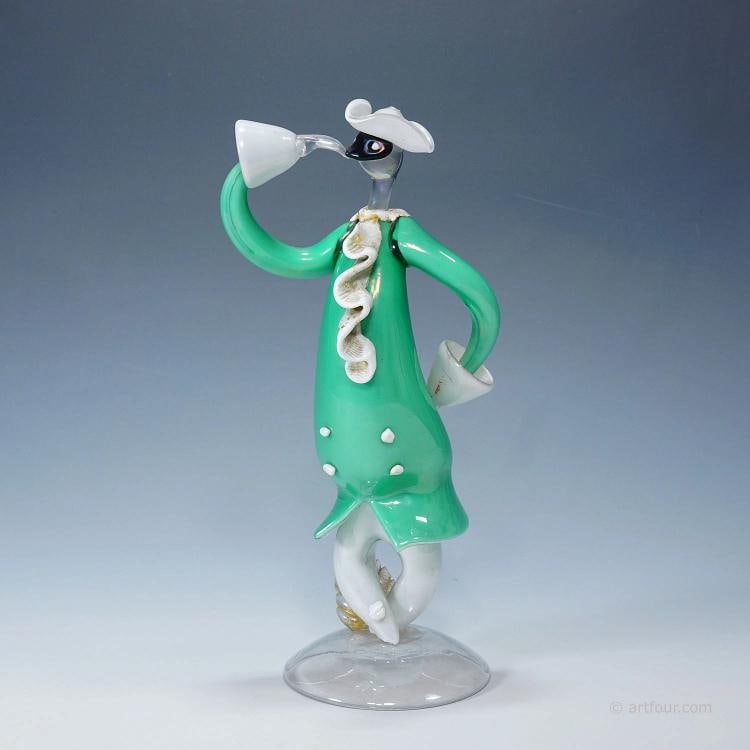 Vintage Murano Art Glass Sculpture of a Venetian Carnivalist, Seguso ca. 1940s: A rare art glass sculpture from the Venetian carnival manufactured most probably by Seguso Vetri D'Arte and designed by Flavio Poli in the 1940ties. Clear glass with turquoise, white and black overlay