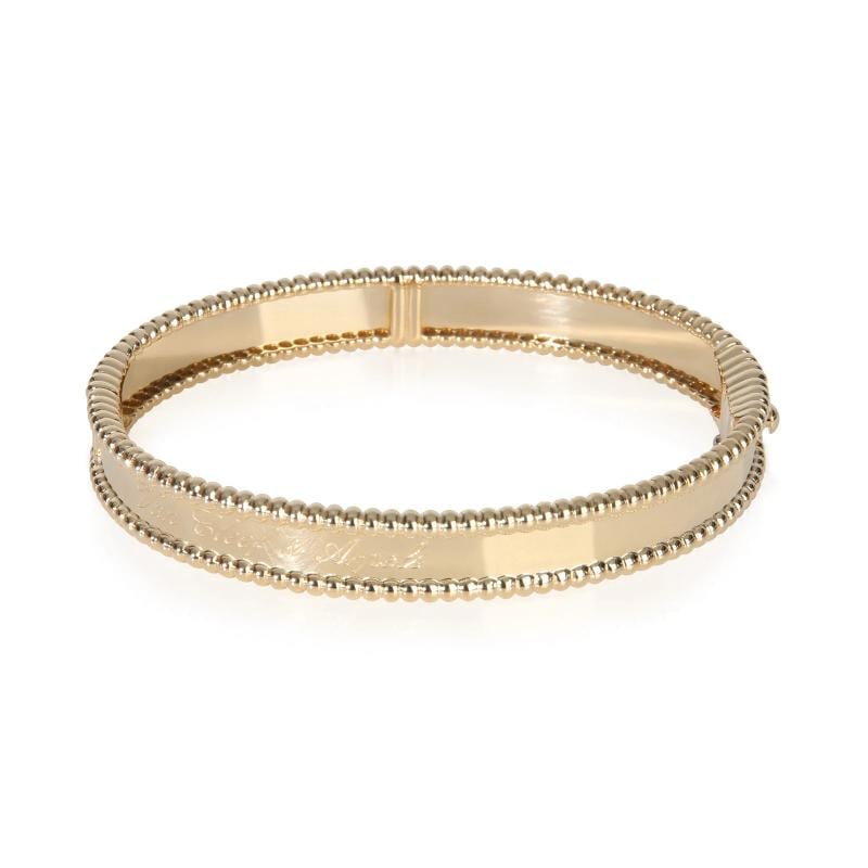 Van Cleef & Arpels Yellow Gold Perlee Signature Bracelet: Condition: Pre-owned,Item Length: 6.25 in,Country of Origin: France,Clasp/Buckle Type: Box with Tongue & Safety,With Original Box/Packaging: Yes,With Papers: Yes,Side Stone Type: No Stone,Metal Purity