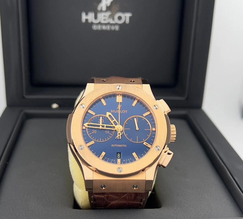 Hublot Classic Fusion Chronograph King Gold Blue 541.OX.7180.RX 18K Rose Gold: Condition: Pre-owned - Excellent,Country of Origin: Switzerland,Bezel Color: Gold, Rose,Movement: Mechanical (Automatic),Seller Warranty: Yes,Reference Number: 541.OX.7180.RX,Band/Strap: Two-Piece Str