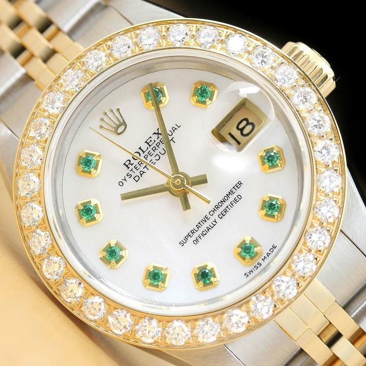 ROLEX LADIES DATEJUST TSAVORITE MOP 1.1 CT DIAMOND 18K YELLOW GOLD SS WATCH: Condition: Pre-owned - Excellent,Bezel Color: Gold,Max Wrist Size: 6.26-6.75 in,Number of Jewels: 29 Jewels,Indices: 12-Hour Dial, Tsavorite Markers,Band: Rolex Two Tone Jubilee Bracelet,Bezel: Custom