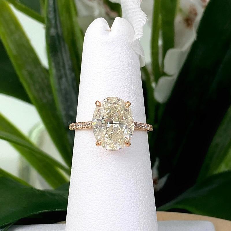 Oval Diamond Engagement Ring set in 18kt Rose Gold: Condition: Pre-owned - Good,Use Occasion: Engagement,Main Stone Creation: Natural,Sizable: Yes,Metal: Rose Gold,Total Carat Weight: 2.00 - 4.99,Modified Item: No,Main Stone: Diamond,Ring Size: