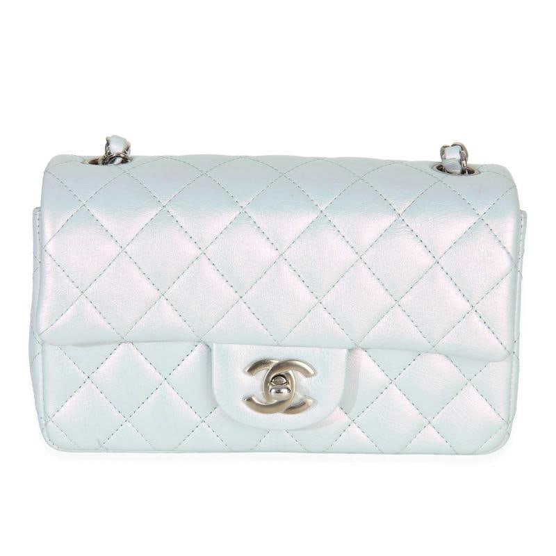 Chanel Blue Iridescent Quilted Goatskin Rectangular Mini Flap: Condition: Pre-owned - Good,Country of Origin: Italy,Dimensions: 7.5 x 5 x 2.5,Handbag Accessories: Dustbag,Bag Width: 7.5 in,Bag Depth: 2.5 in,Bag Height: 5 in,Department: Unisex,Style: Crossbody Bag