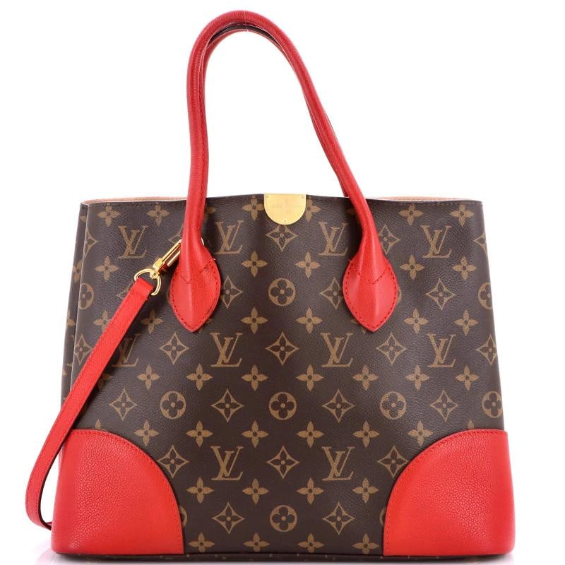 Louis Vuitton Flandrin Handbag Monogram Canvas and Leather: Accessories: With Strap Measurements: Handle Drop 5", Height 10", Width 13", Depth 6", Strap Drop 16". Condition: Pre-owned - Good,Brand: Louis Vuitton,Exterior Material: Canvas Coated,Style: