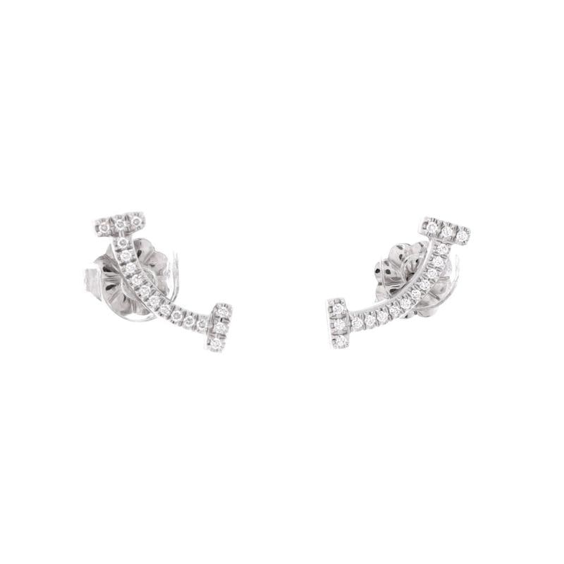 Tiffany & Co. T Smile Stud Earrings 18K White Gold and Diamonds: Measurements: Height/Length: .18 ", Width: 13.35 mm . Condition: Pre-owned - Good,Brand: Tiffany & Co.,Main Stone: Diamond,Metal: 18K White Gold,Metal Purity: 18K,Style: Stud,Type: Earrings,Color: