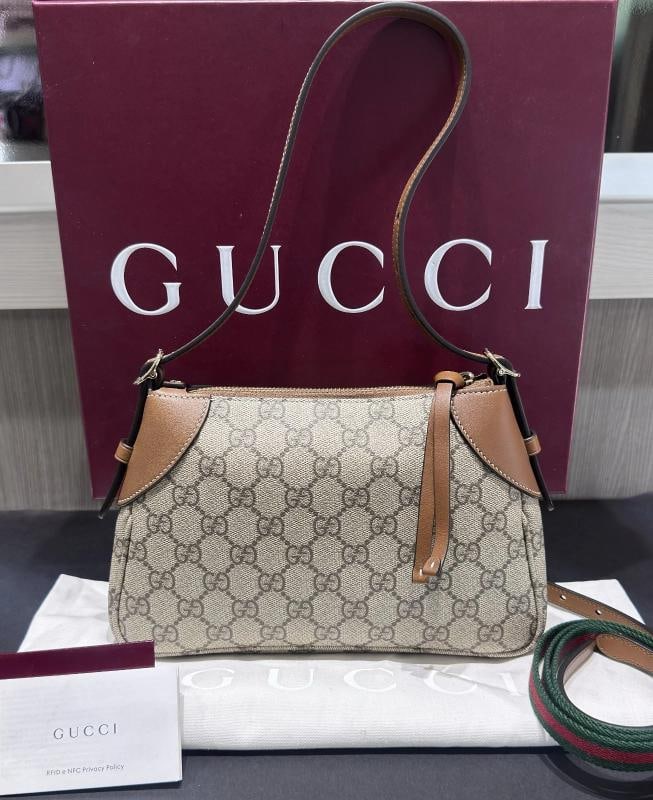 Gucci Supreme Small Emblem Crossbody (Model 815218): Condition: Pre-owned - Excellent,Brand: Gucci,Department: Women,Size: Small,Exterior Color: Beige & Brown,Style: Shoulder Bag,Exterior Material: coated canvas,Country of Origin: Italy This pre-owned G